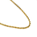 Chaine fine torsadé en acier inoxydable plaqué or.
